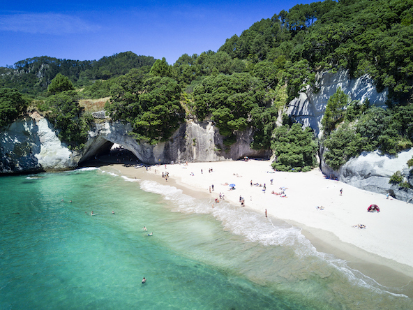 Tourist, sand and beach of Cathedral Cove